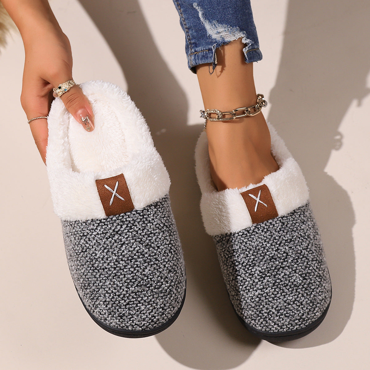 Luxurious plush winter slippers providing warmth and comfort on cold floors.