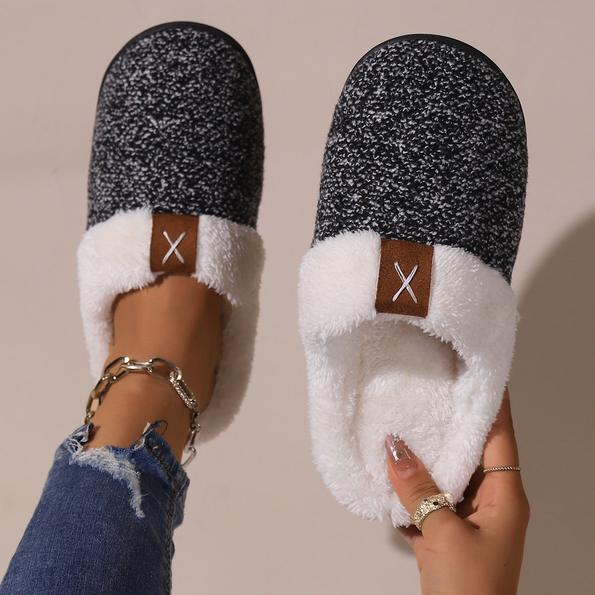 Luxurious winter slippers in plush material providing warmth and comfort.