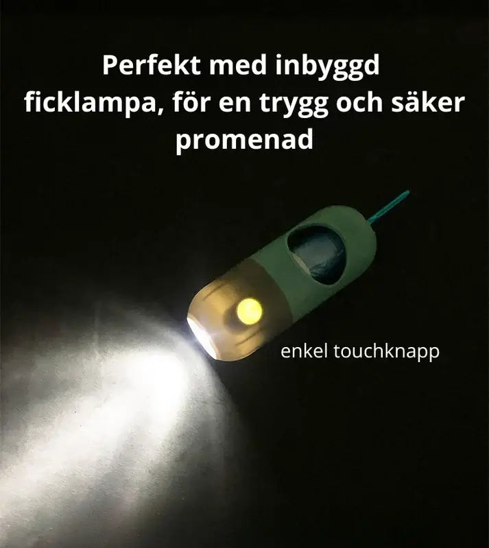 PooPal™ hundbajspåsehållare med inbyggd ficklampa för säkrare kvällspromenader.